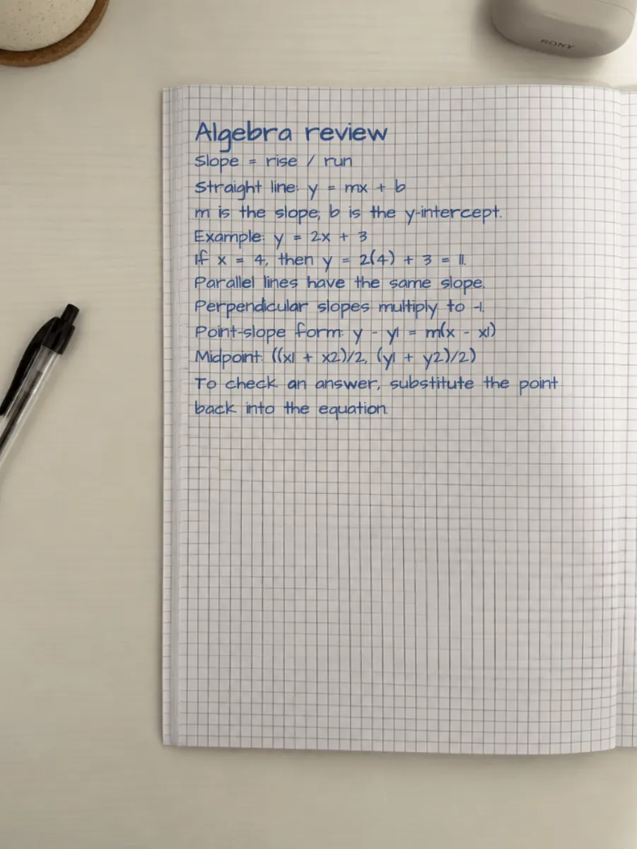 Handwritten algebra notes on a photographed square-grid notebook