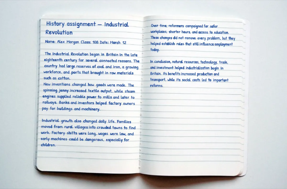 Blue handwritten history answers in an open lined notebook